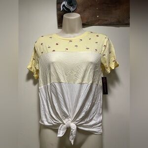 Cute yellow and white top with mushroom print NWT
Size XS